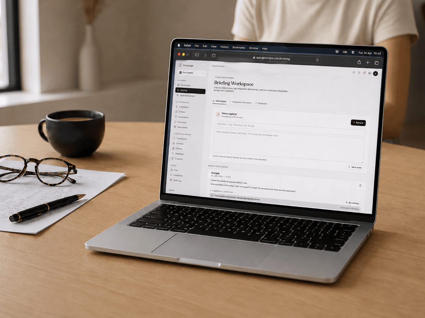 Discovery interview — consultant and client lead reviewing policy stack.